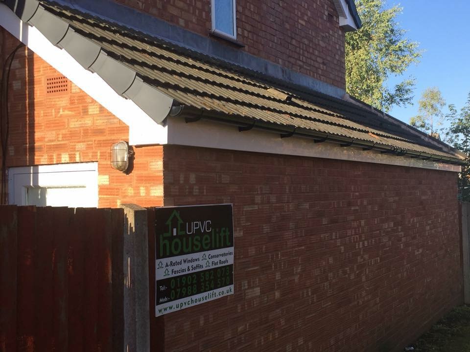 White fascia, soffits & black guttering.Grey Dry Verge Caps