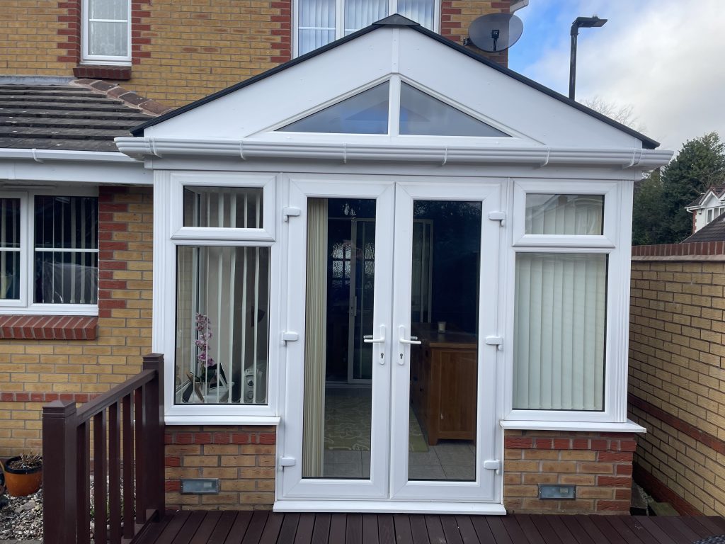 Completed tiled Warmer Roof conservatory by uPVC Houselift