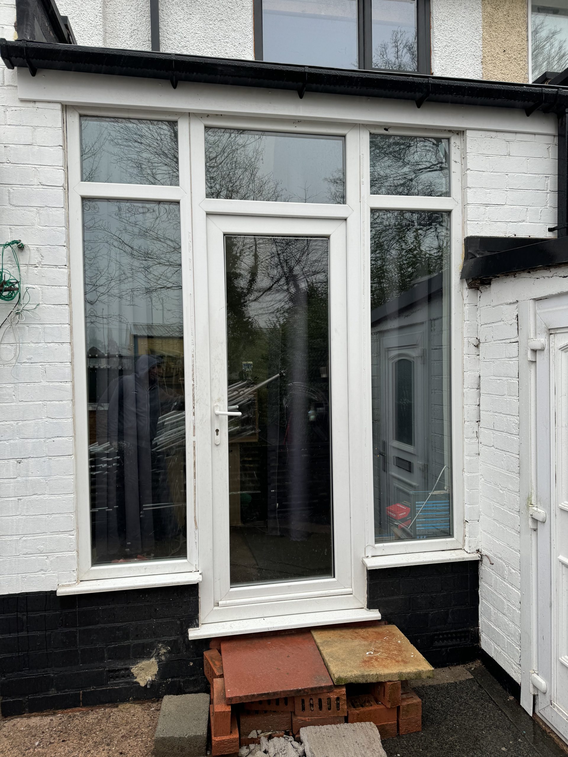 Opening before black aluminium bifold doors were fitted in Wolverhampton