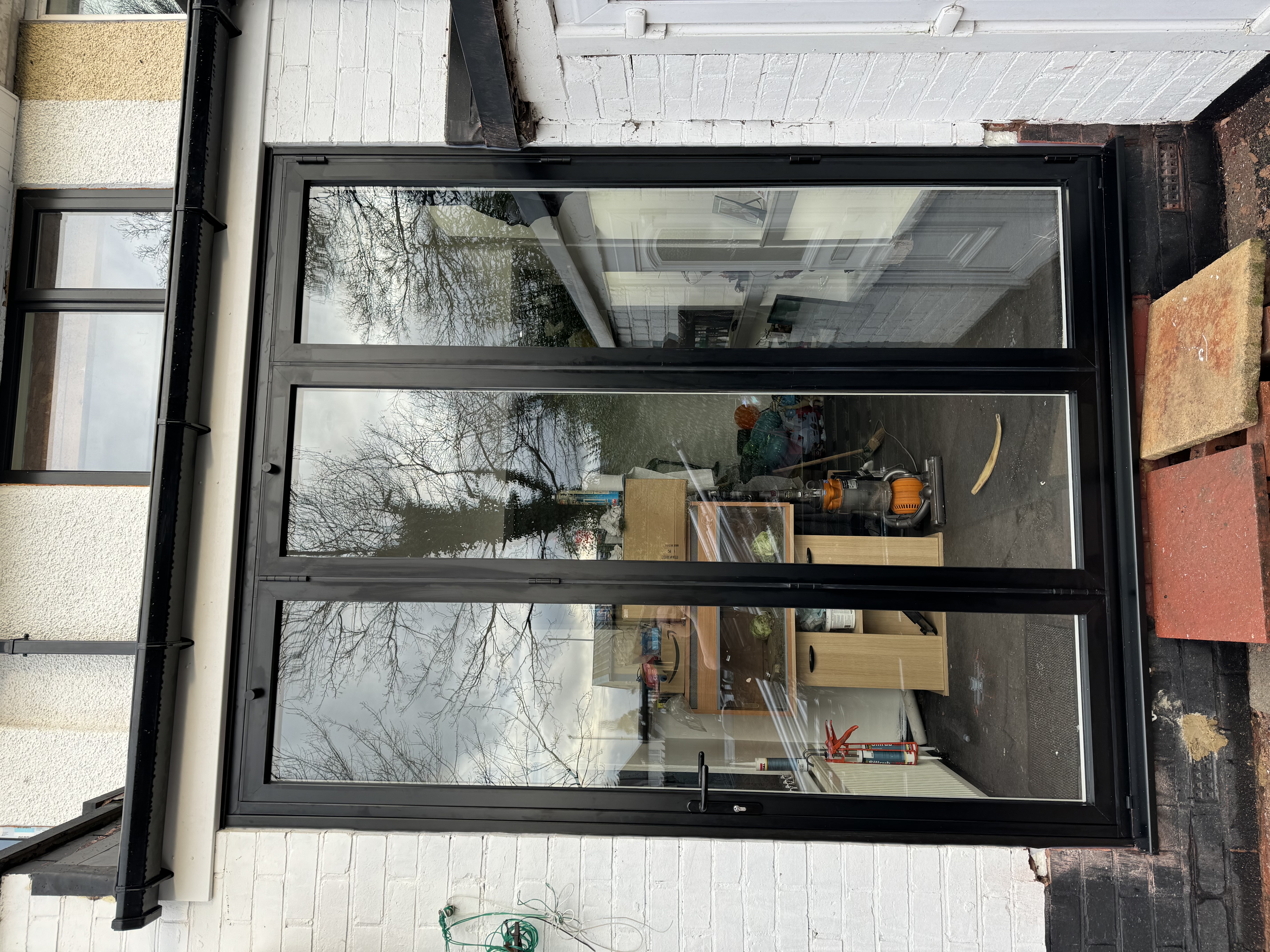 Black aluminium bifold doors installed in Wolverhampton