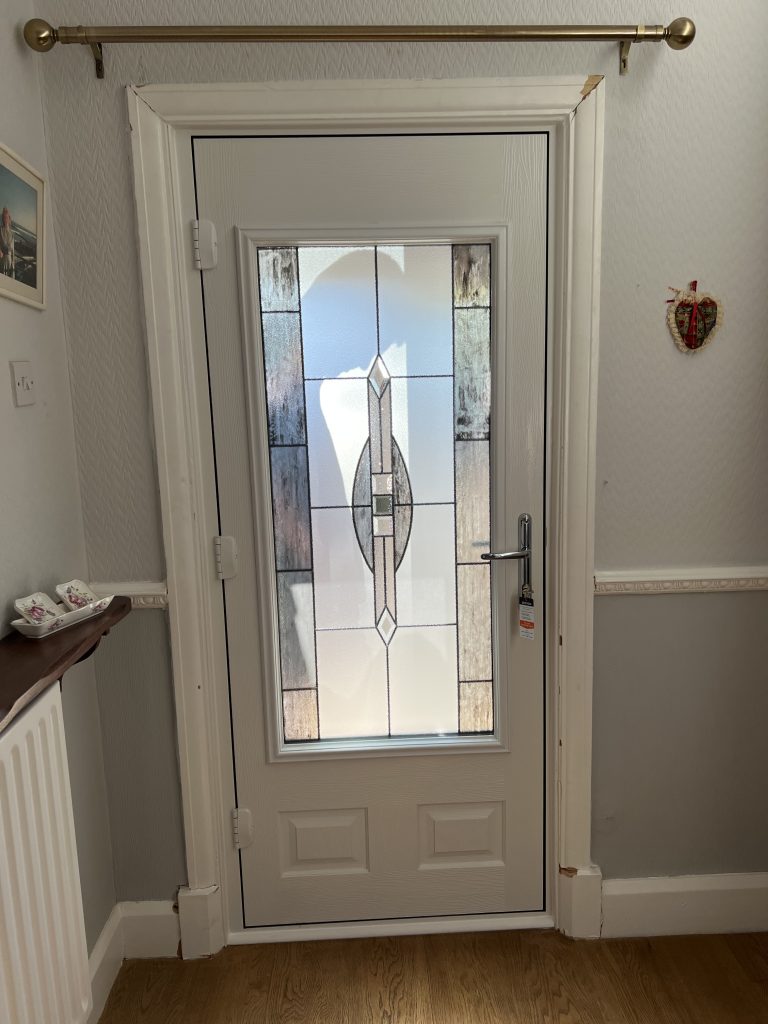 Internal view of a white composite entrance door fitted in Castlecroft, Wolverhampton