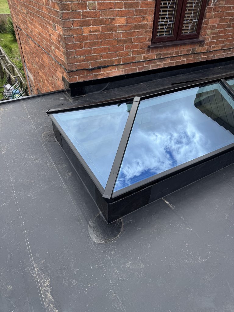 EPDM rubber flat roof with a pyramid roof lantern installed by uPVC Houselift