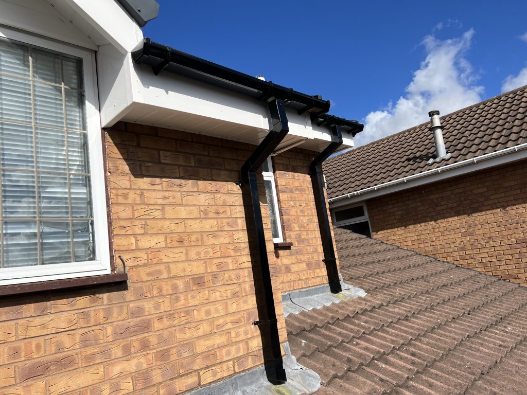 whiye upvc fascia, soffit and black guttering