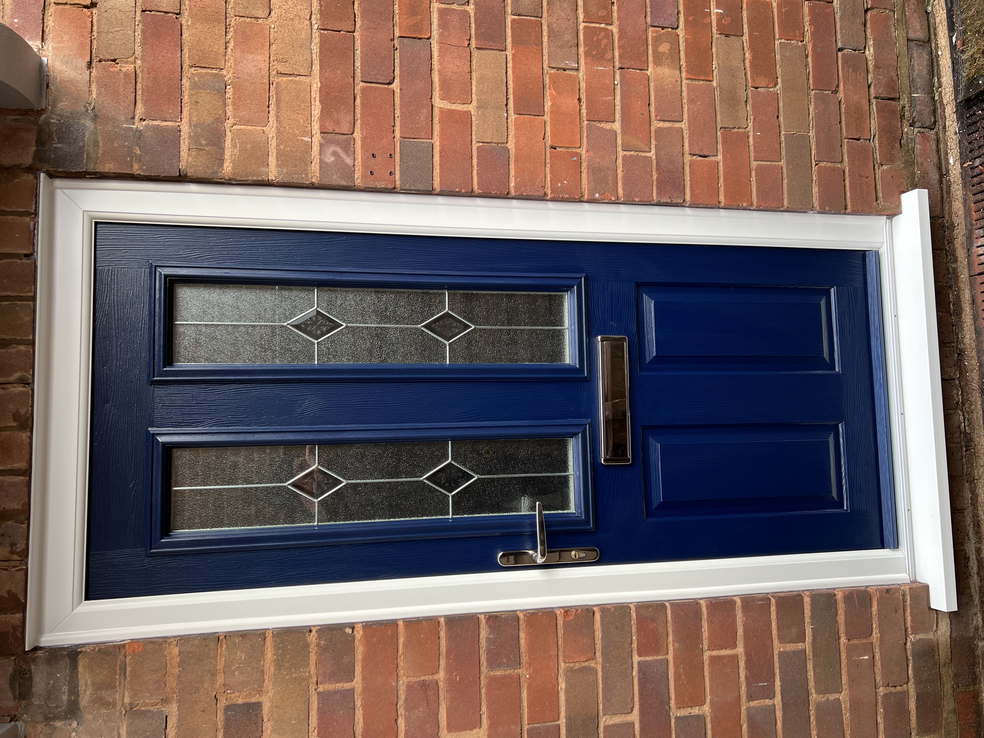 Blue composite entrance door installed by uPVC Houselift