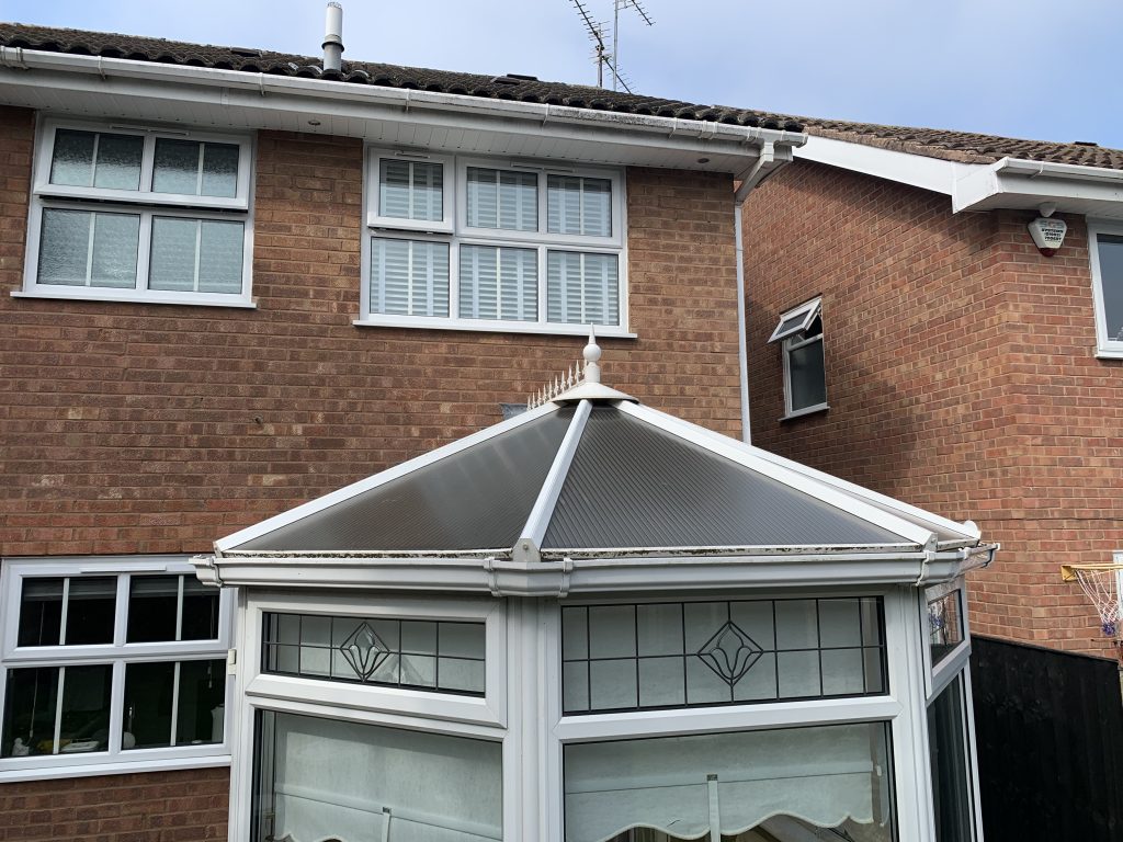 Original polycarbonate conservatory before Warm Roof replacement by uPVC Houselift