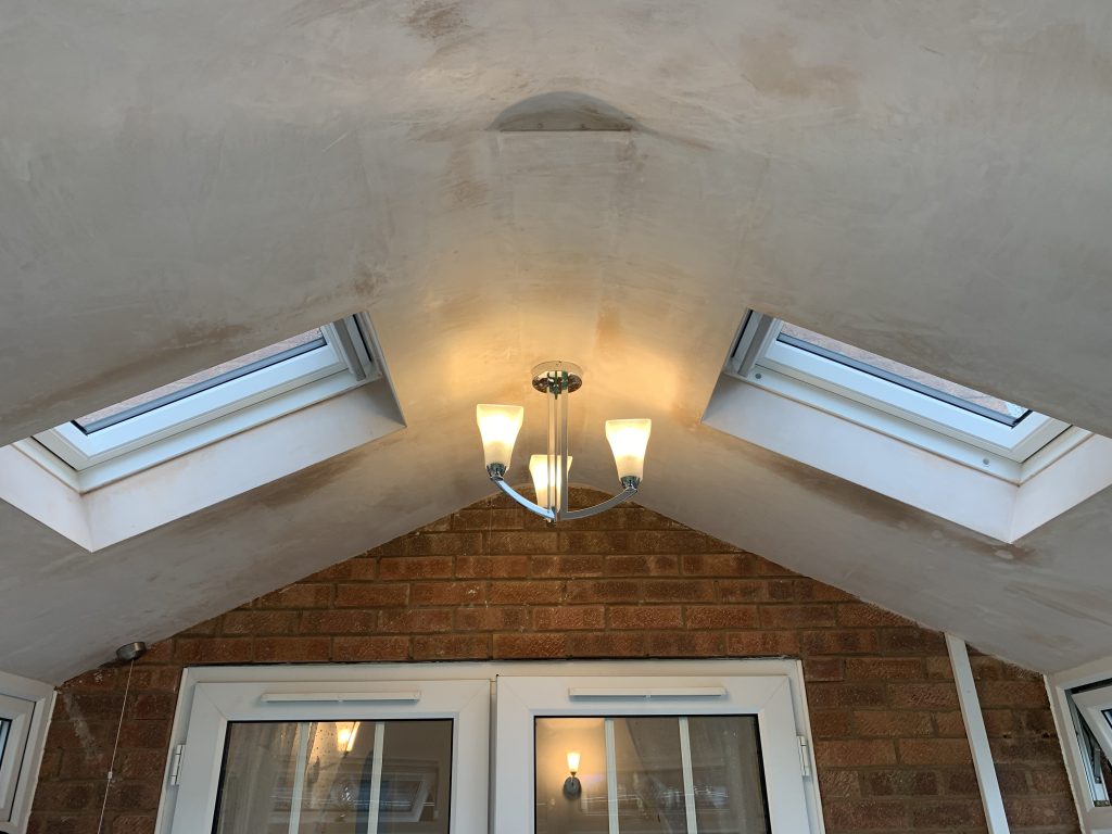 Finished vaulted Warm Roof ceiling with roof windows inside conservatory