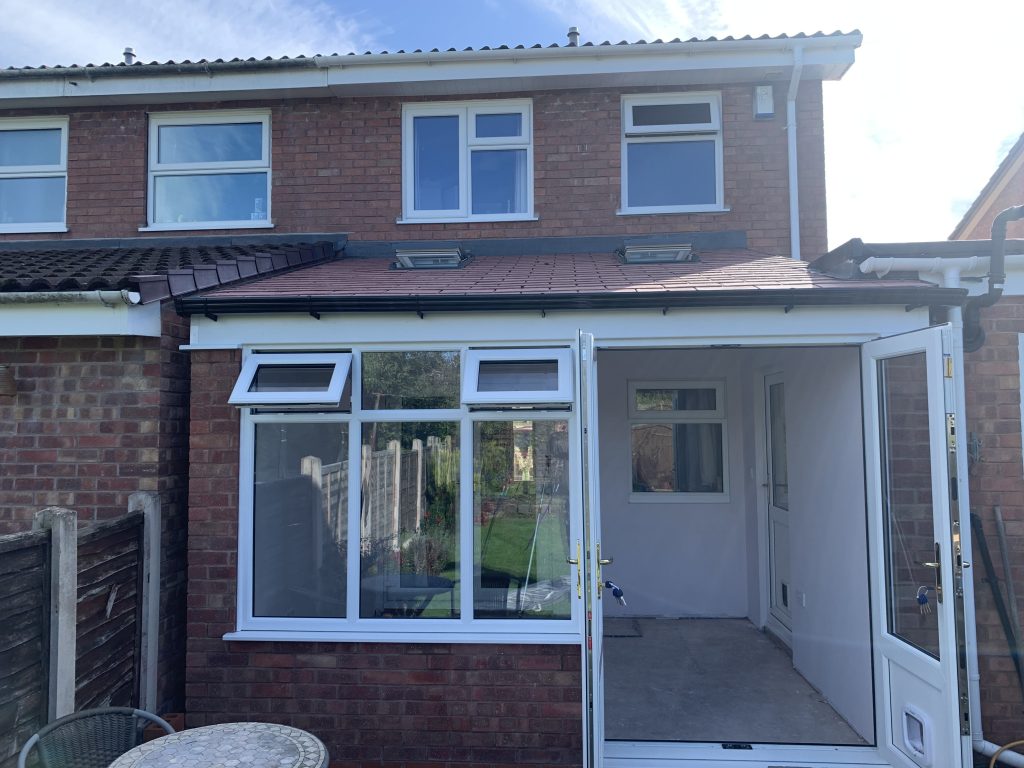 Completed Warmer Roof, With REHAU frames Red rock compisite tiles. Conservatory near Featherstone