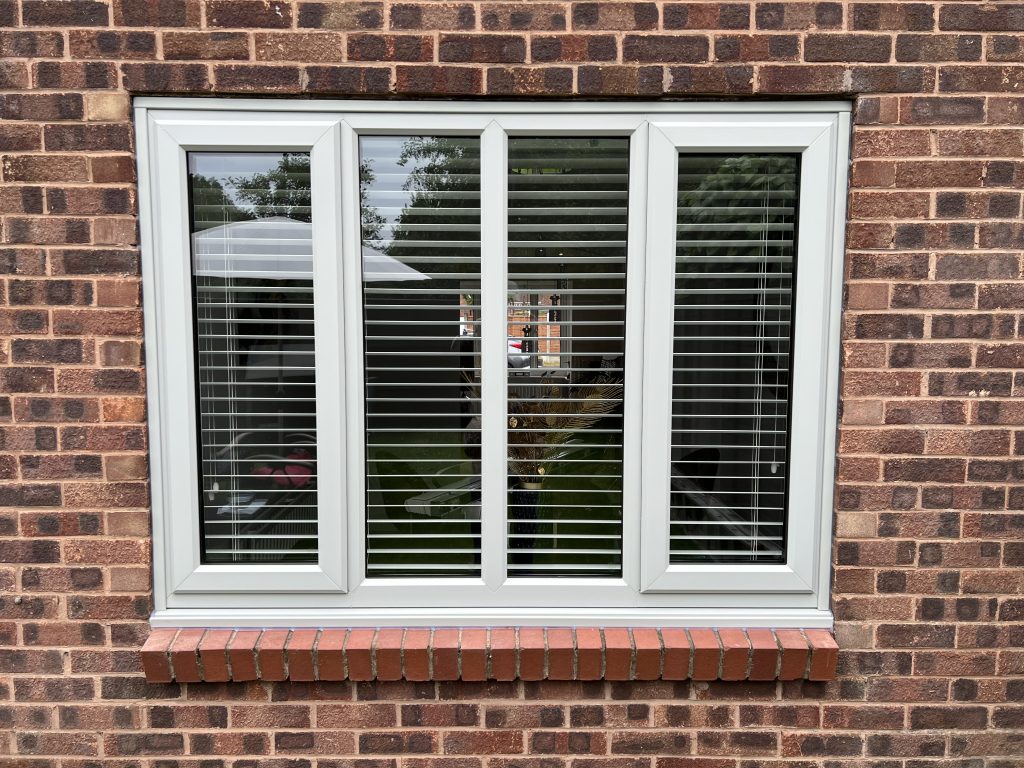 Agate grey uPVC bay window installed by uPVC Houselift in Perton with integral blinds and energy-efficient double glazing