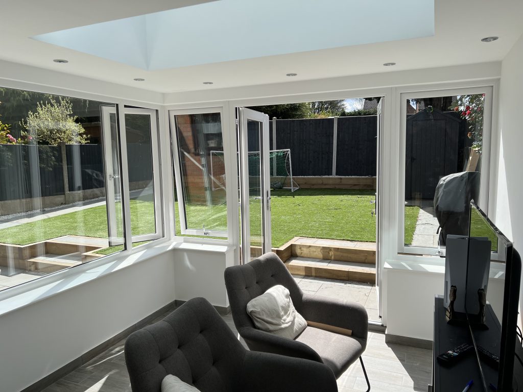white Rehau uPVC windows on this conservatory